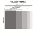 A Christmas tablecloth depicting the birth of Jesus in a sacred style, with white and red decorations and angels.zyc